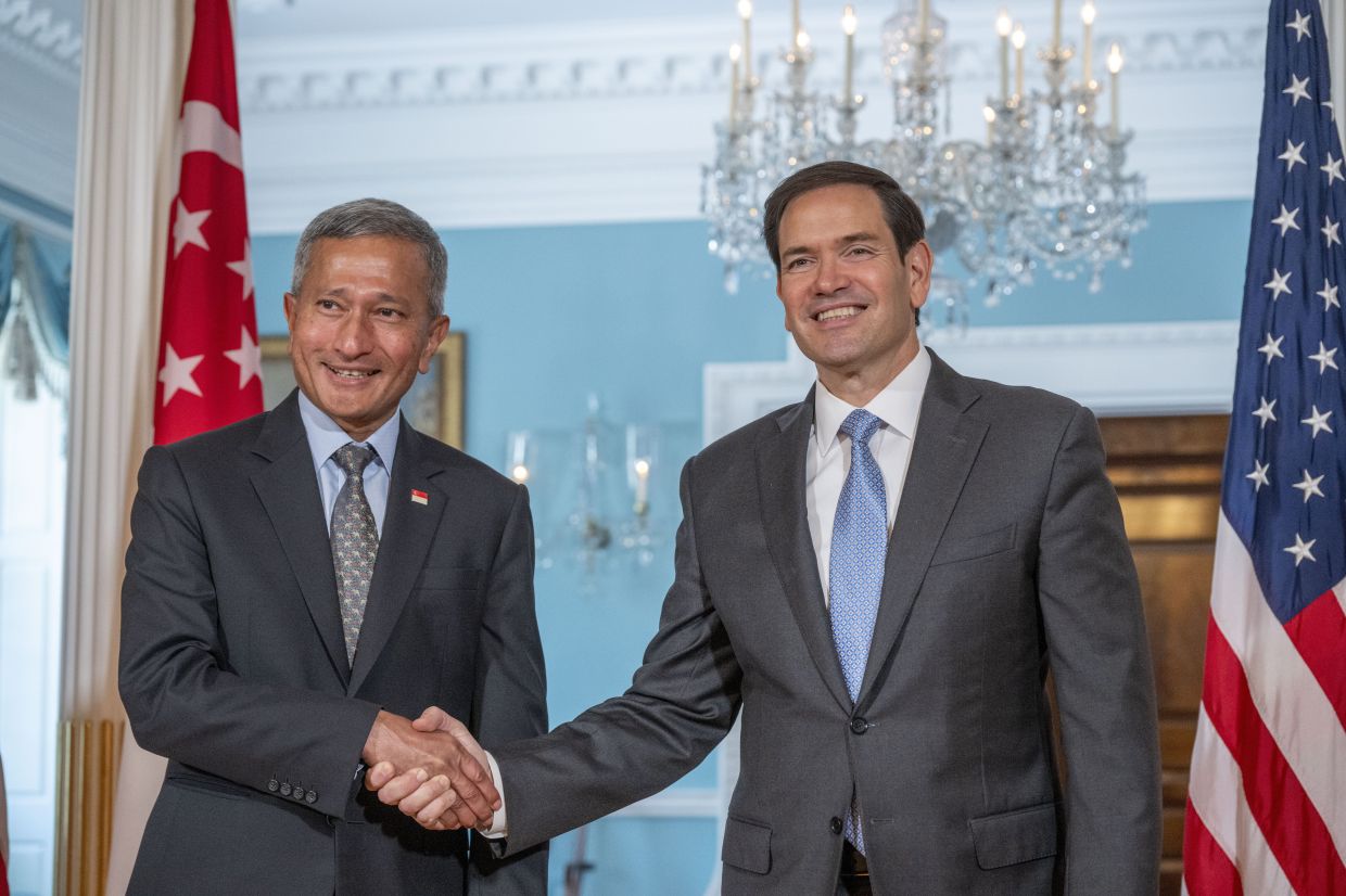 Secretary of State Marco Rubio (right) meets with Singaporean Foreign Minister Vivian Balakrishnan at the State Department in Washington.-- AP Photo/Kevin Wolf