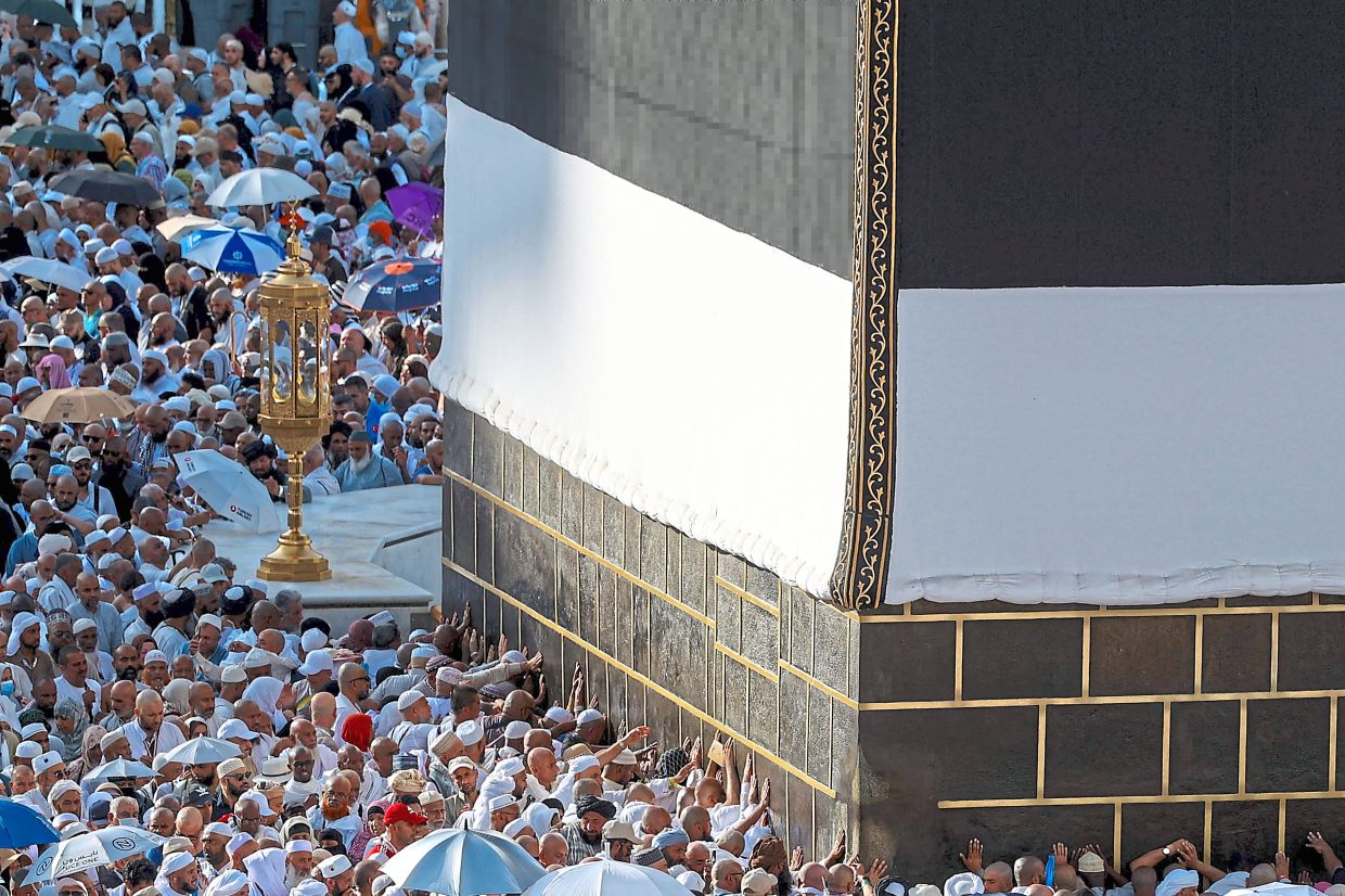 The white band around the Kaabah signifies that the Haj season is here. — AFP