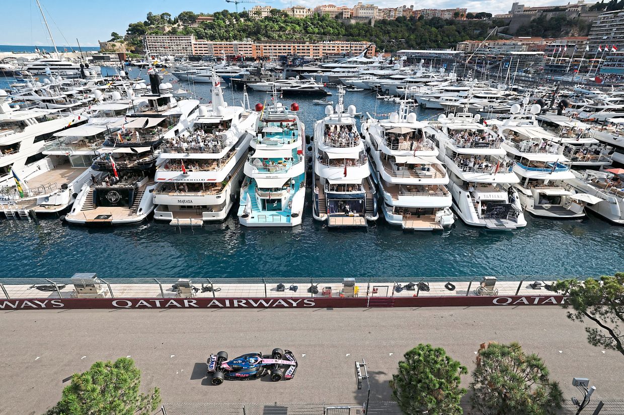 Alpine’s Pierre Gasly in action as spectators on yachts look on during practice for the Monaco Grand Prix. — Reuters