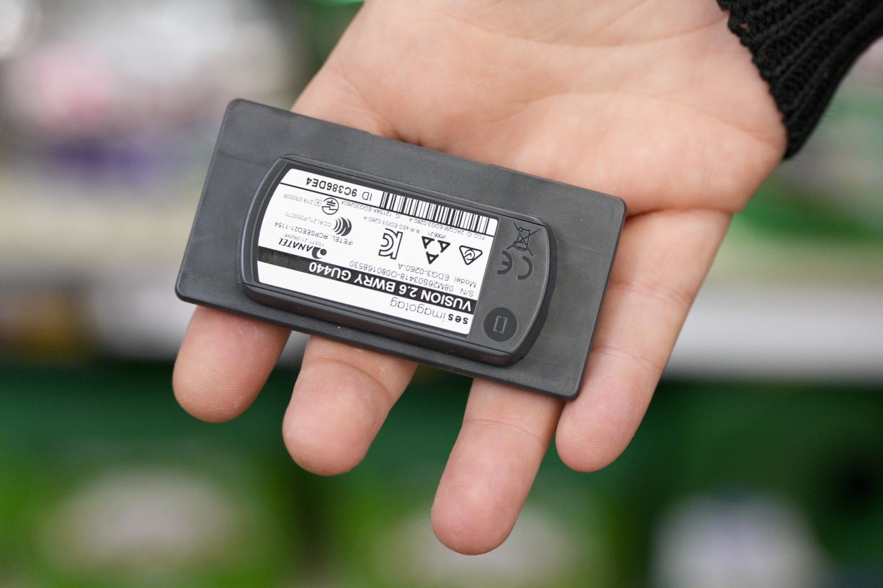 Electronic grocery labels are displayed at a Kroger grocery store, in Monroe, Ohio. — AP