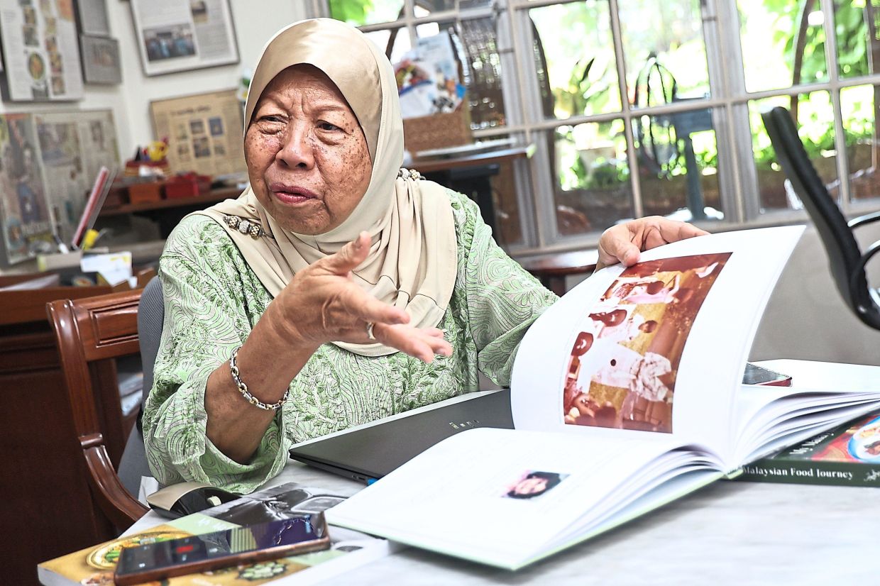 Kalsom says putting the book together was relatively easy but finding old pictures to adorn the pages was a little tougher. — AZMAN GHANI/The Star 