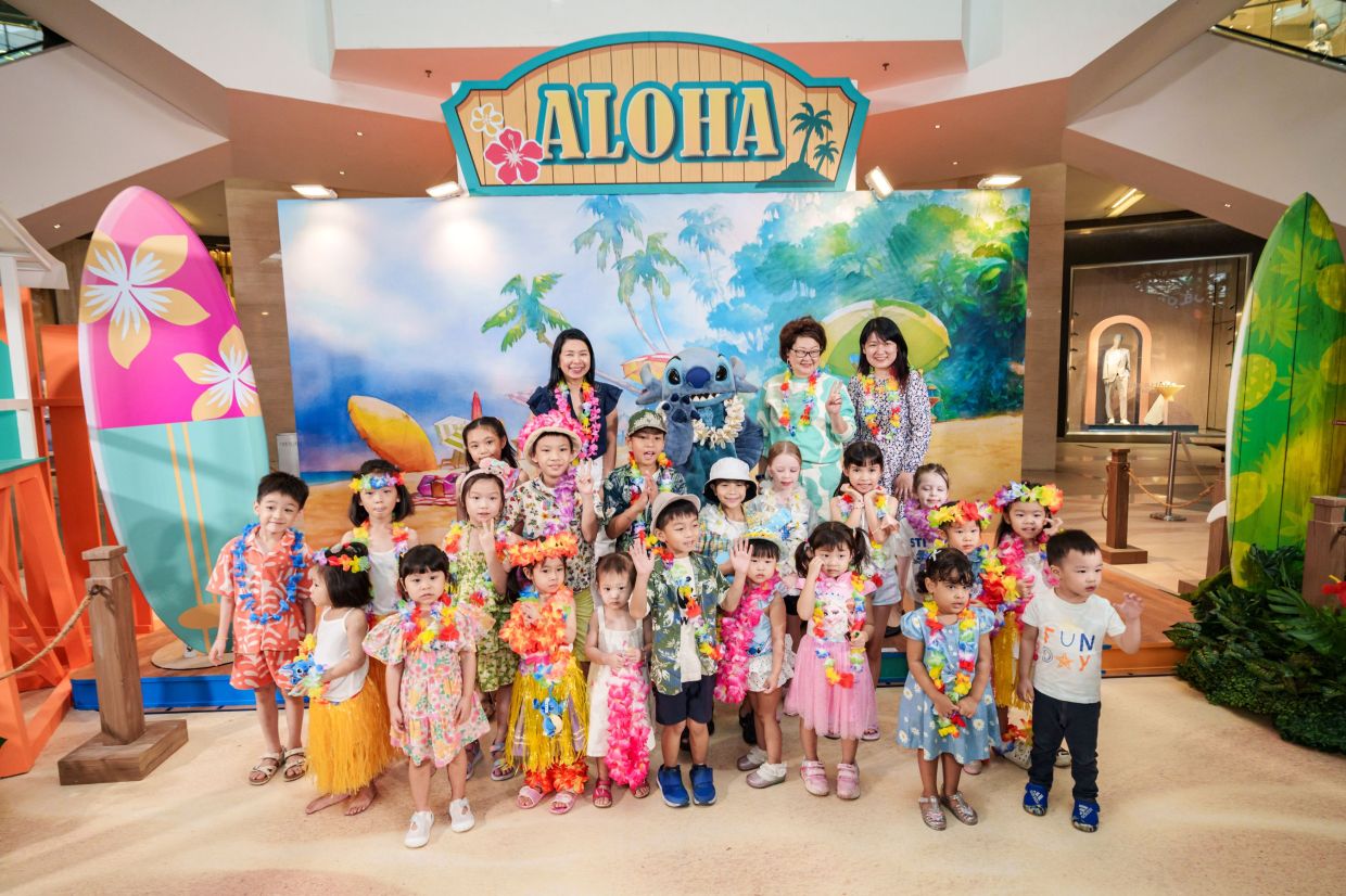 (From left) The Walt Disney Company brand commercialisation (Malaysia) director Geraldine Naidu, Stitch mascot, Yap and executive vice president, group community financial services marketing head (regional cards) Vichelle Woon spreading the Ohana fun with Pavilion Junior.