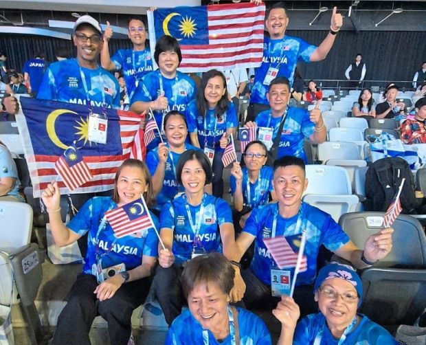 Good job: Malaysia’s veteran athletics squad celebrated a commendable outing at the World Masters Games in Taipei City. — Malaysian Masters Athletics Association