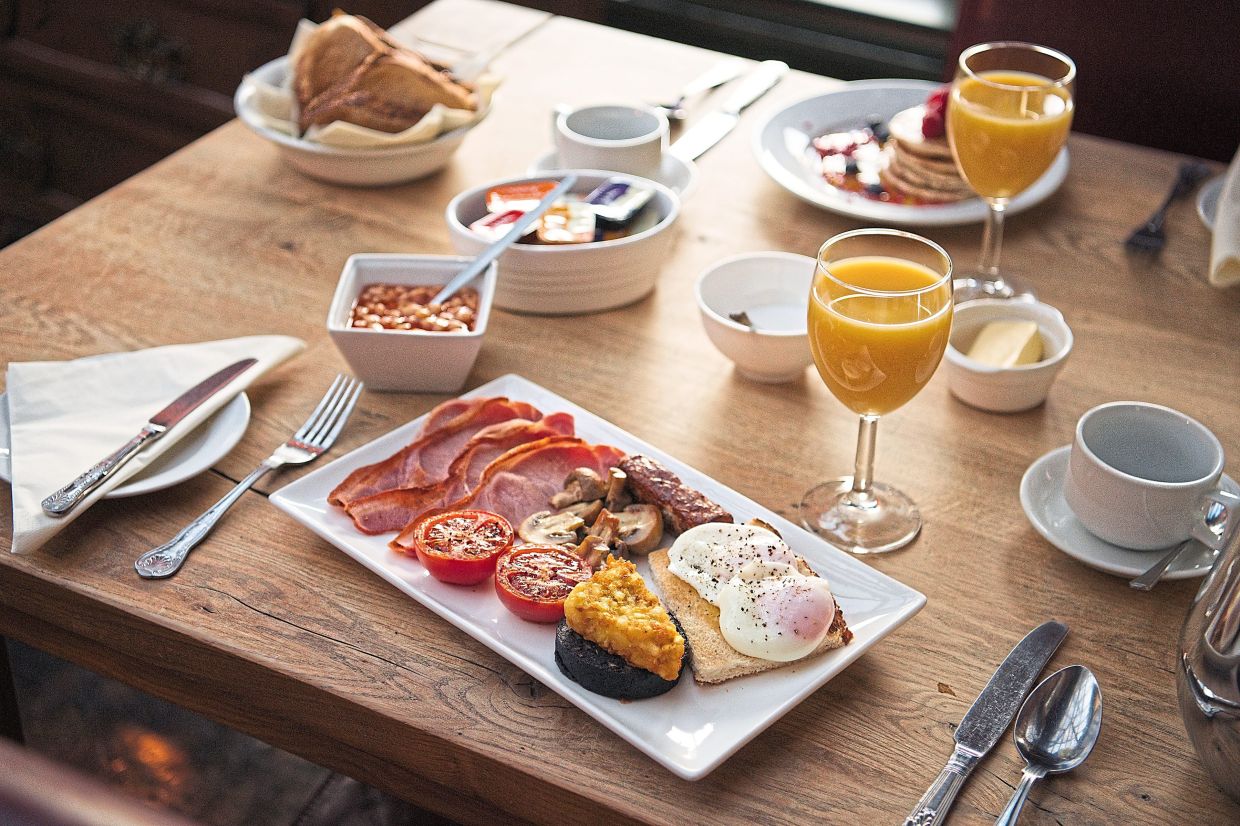 A table set for breakfast in the dining area at the Exhibition.