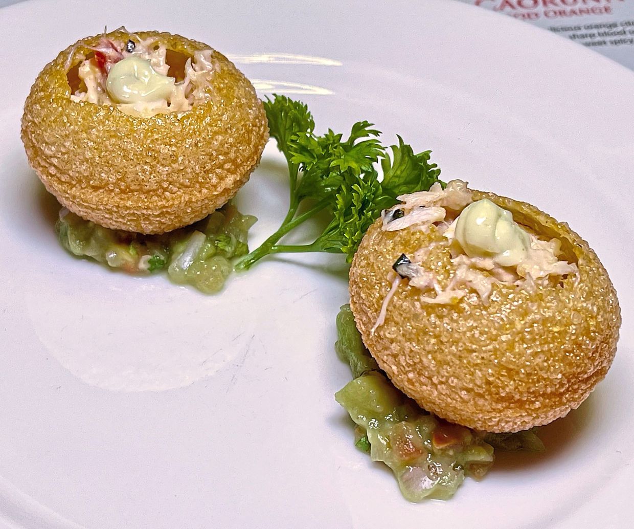 ‘Pani puri’ with a filling of blue crab meat, mashed potato, boiled eggs, Dijon mustard, fresh dill, rosemary and thyme.