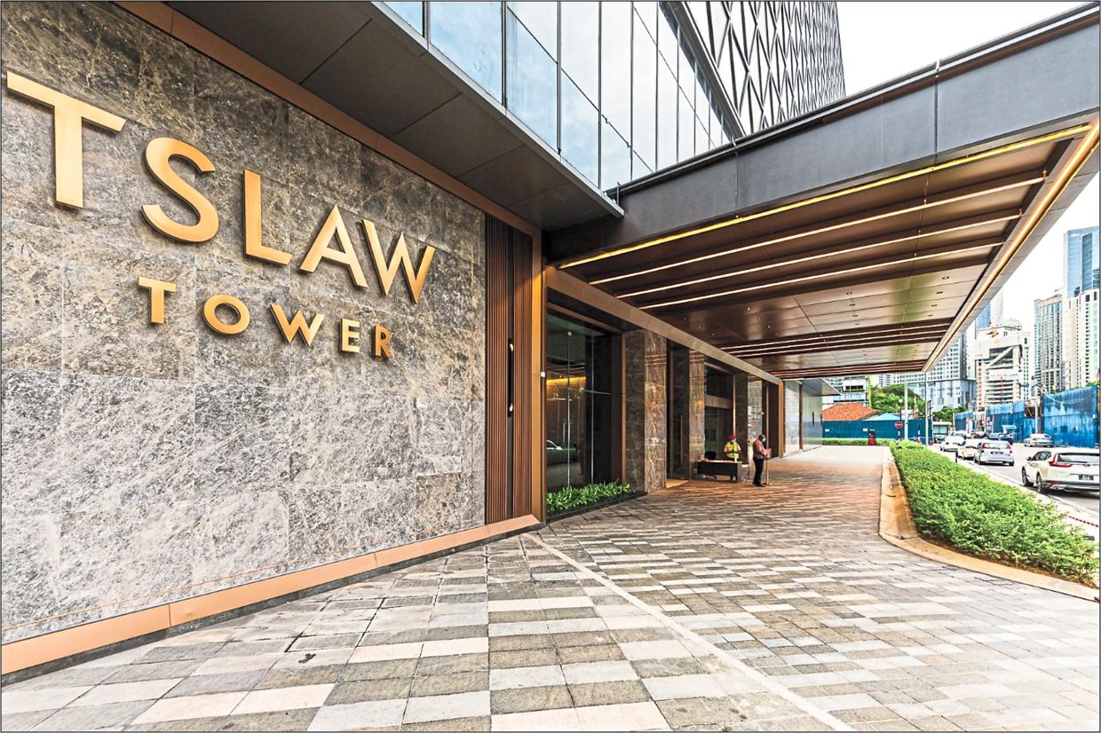 The tower's entrance signage and grand drop-off area.