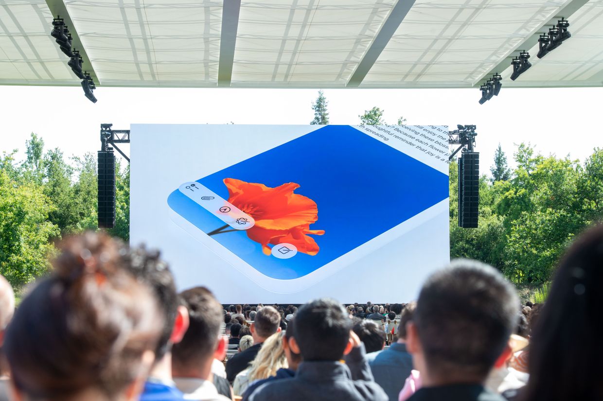In what Apple is marketing as 'Liquid Glass', software will have more glass-like transparent buttons, apps and other text elements that appear to float above what's behind it.