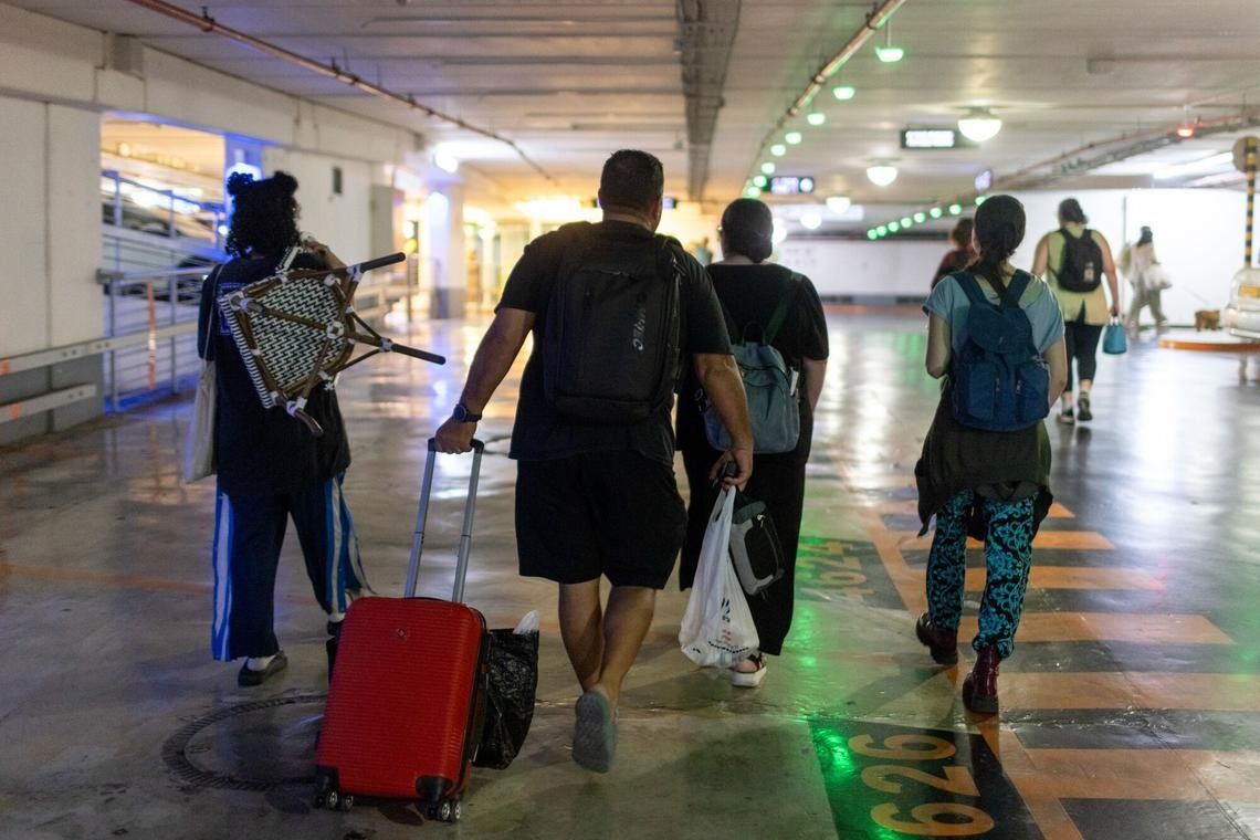 Residents take shelter during an Iranian ballistic missile attack in Tel Aviv, Israel, on June 13. - Photo: Bloomberg