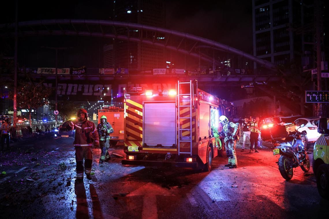 First responders work at an impact site following missile attack from Iran on Israel, in Tel Aviv, on June 14. - Photo: Reuters