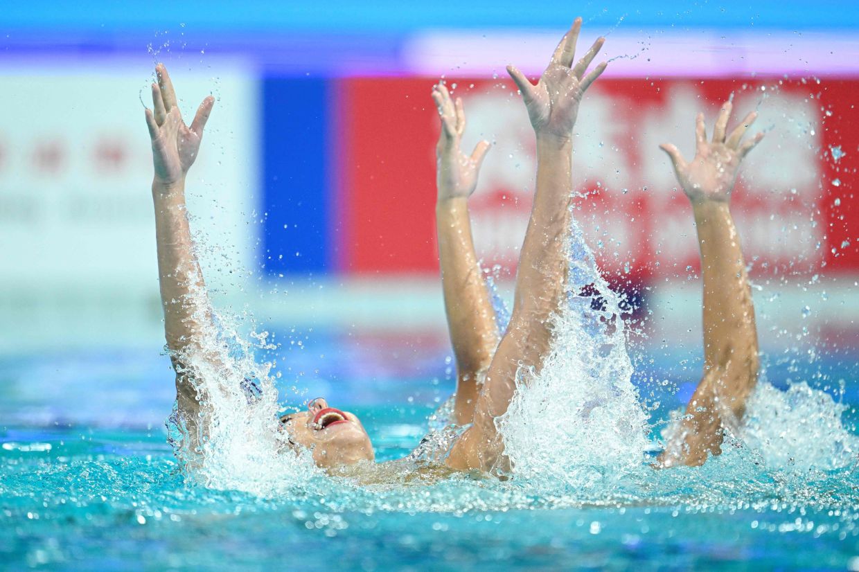 Singapore's Lee Kiera and Soh Debbie compete in the women duet free event during the World Aquatics Artistic Swimming World Cup 2025 Super Final in Xi'an, in China's Shannxi province on Saturday, June 14, 2025. -- Photo by WANG Zhao / AFP