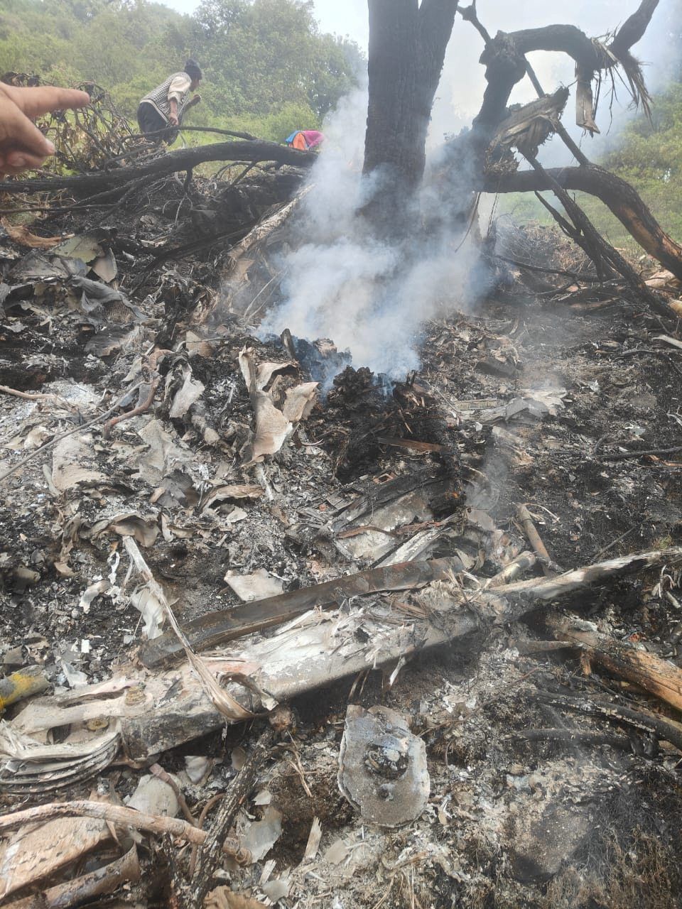 Smoke billows at the site of a chopper crash in the Gaurikund area of the northern Indian state of Uttarakhand, India, June 15, 2025. - Photo: State Disaster Response Force (SDRF) Uttarakhand/Handout via Reuters