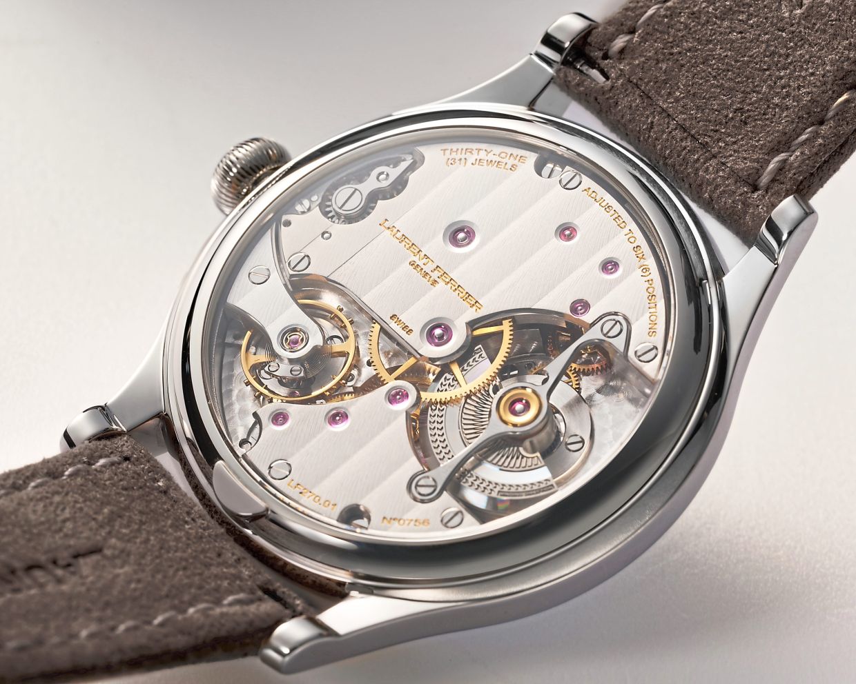 The sapphire crystal caseback shows off a hand-decorated movement, with the highest attention to detail.