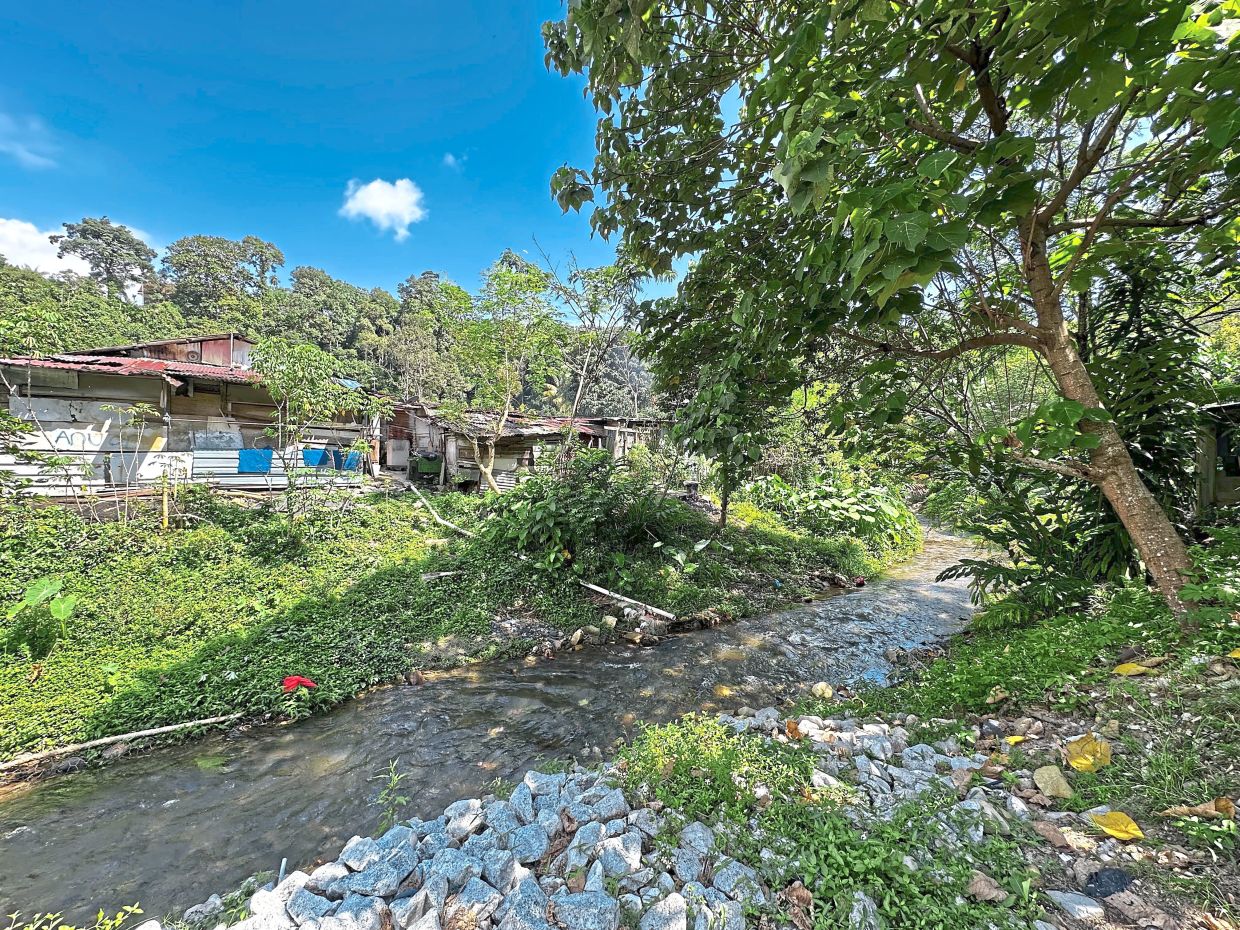 One of the structures built along Sungai Kemensah has a drainage pipe leading straight into the river.