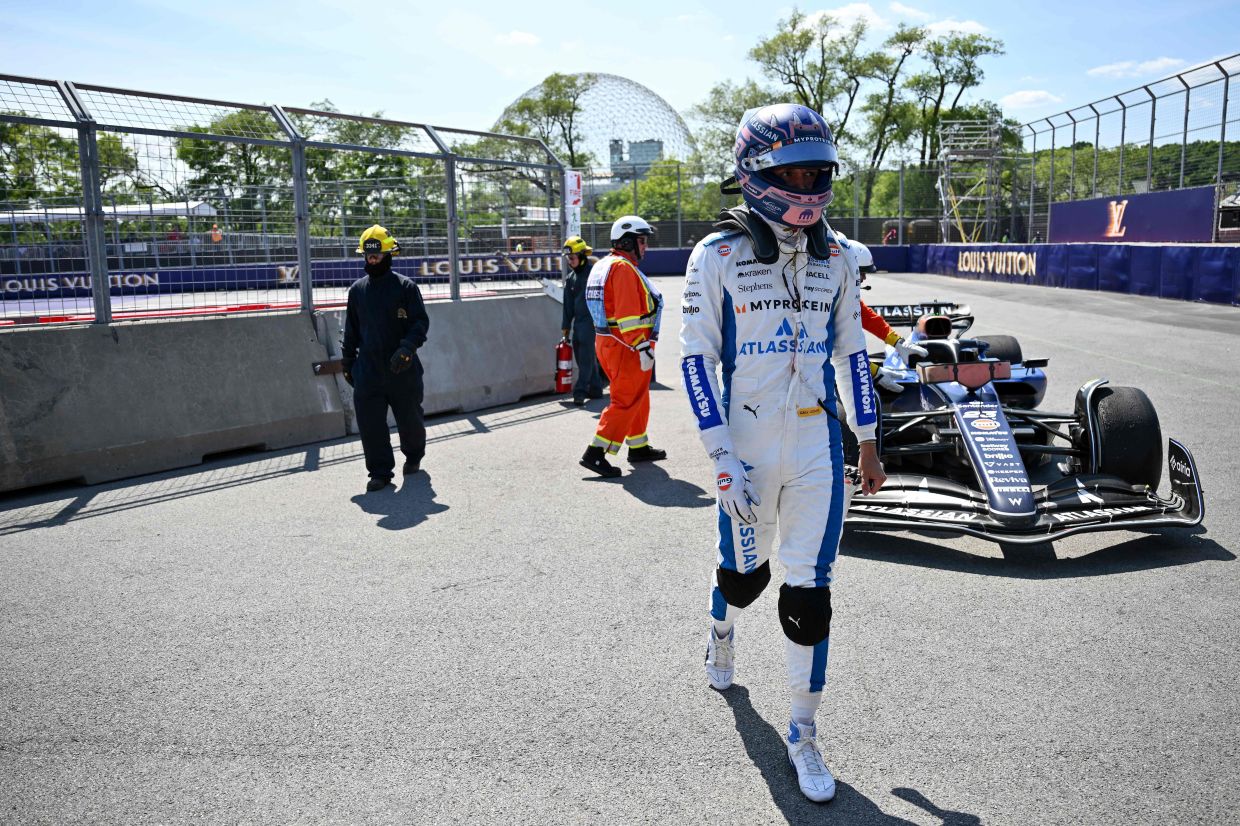Alexander Albon of Thailand and Williams walks away from his car during the F1 Grand Prix of Canada at Circuit Gilles-Villeneuve in Montreal, Quebec.-- Minas Panagiotakis/Getty Images/AFP 