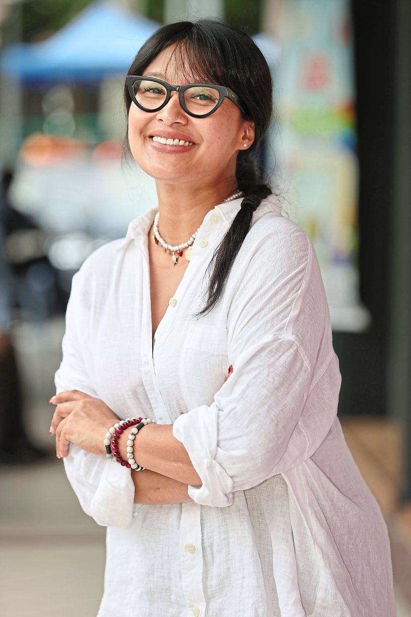 Nabila plays The Woman in a restaging of Jit Murad’s 'Visits', a sharp, surreal take on mental health, class, and the fine line between care and control. Photo: The Star/Glenn Guan