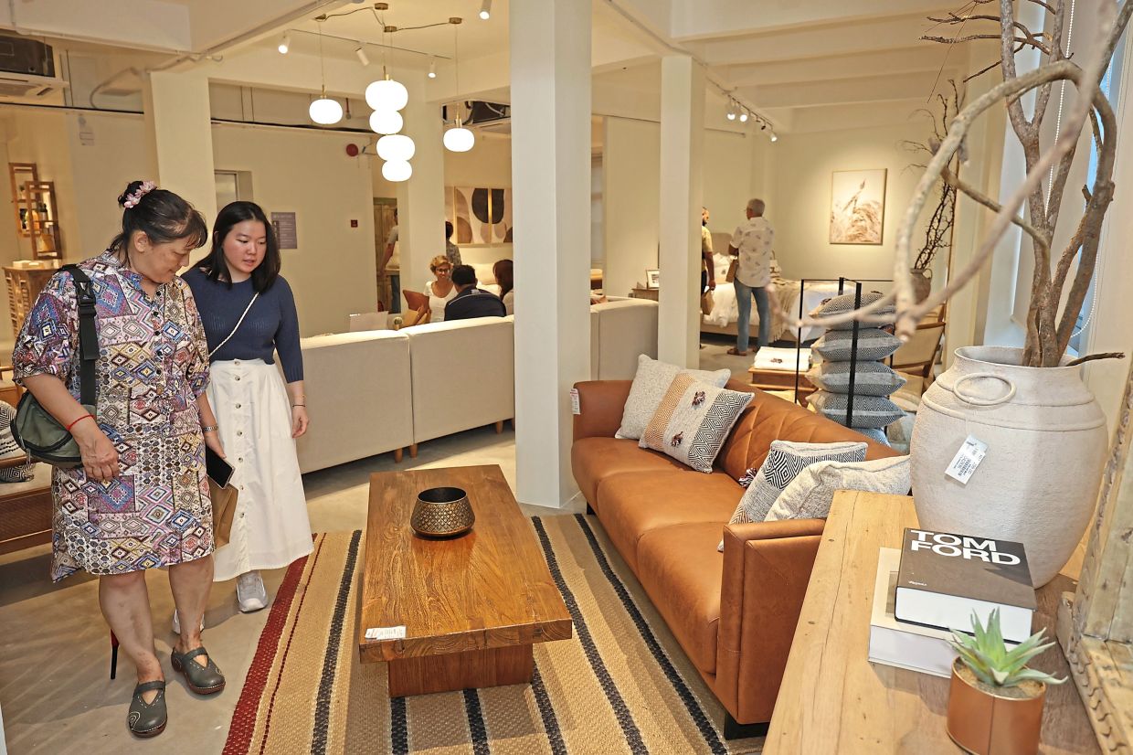 Guests browsing the curated furniture on display at the five-storey showroom.