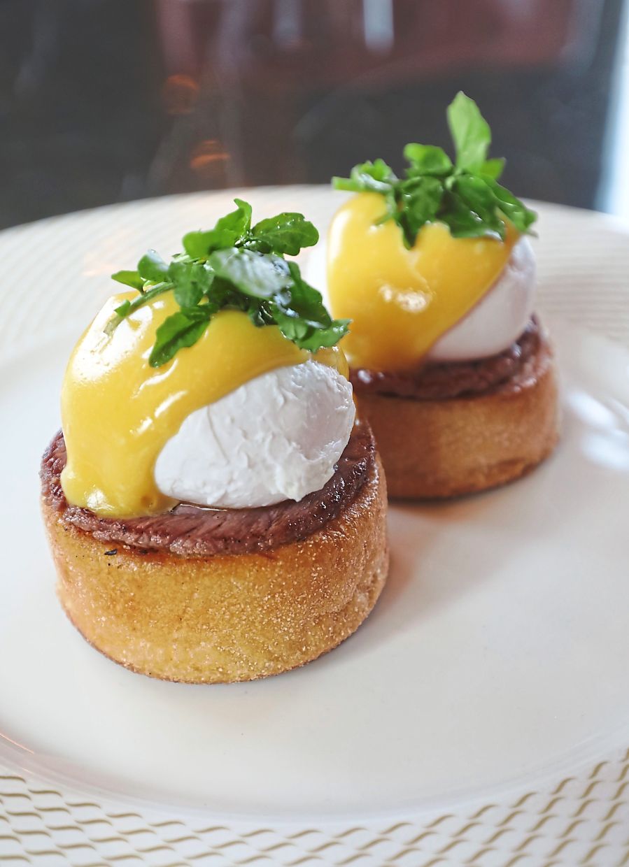 Eggs Benedict comprising muffin, chicken ham, poached eggs and silky Hollandaise sauce. — Photos: SAMUEL ONG/The Star