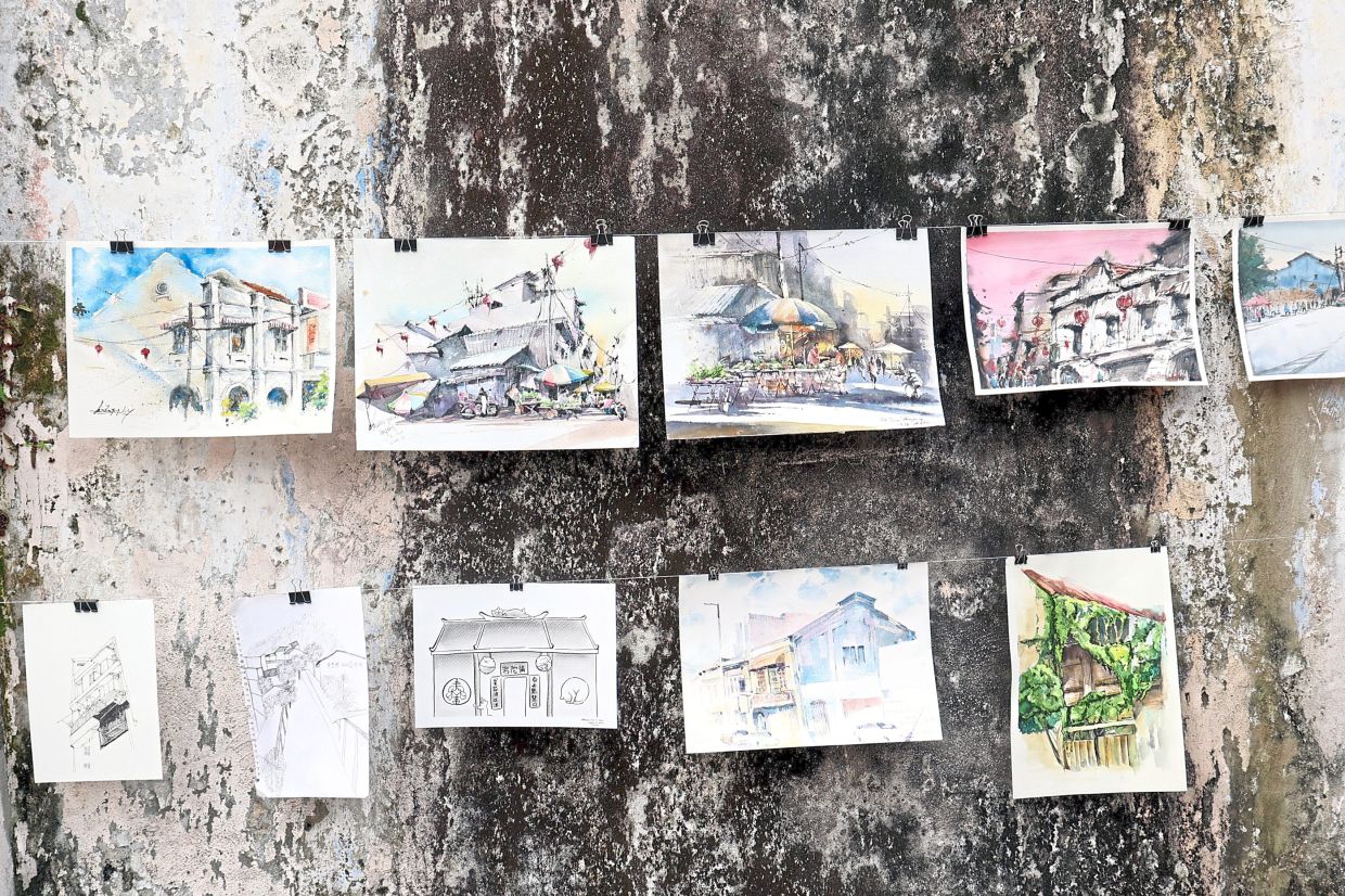 Over 60 artworks from the sketching programme are displayed during the launch of the ‘Asal Usul Ampang’ mural.