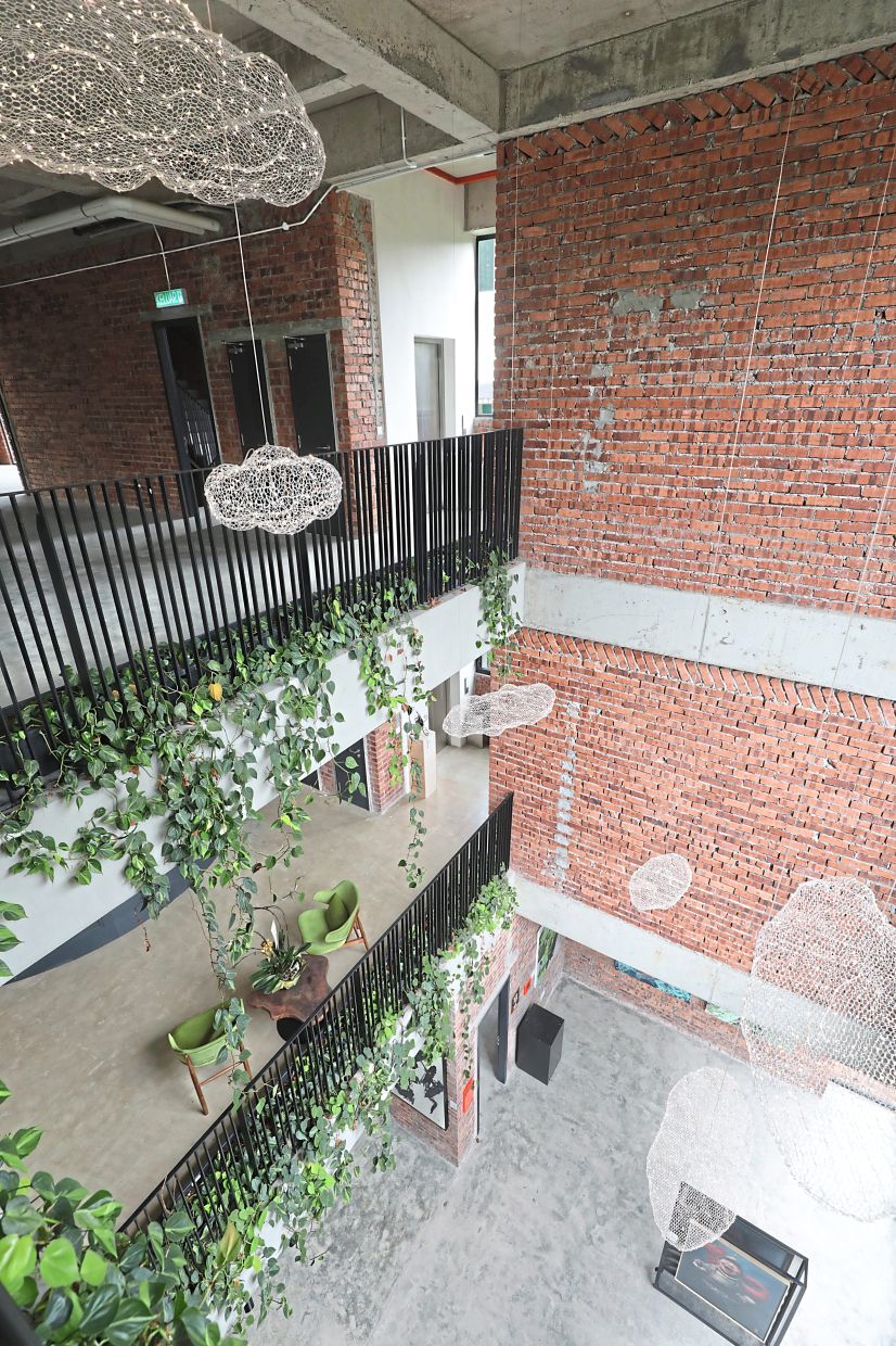The vast airwell allows natural light to flood the building.