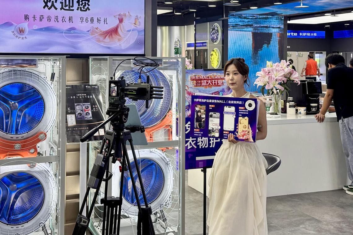 A live-stream host selling products online at JD Mall in Beijing on June 18. - Photo: ST 
