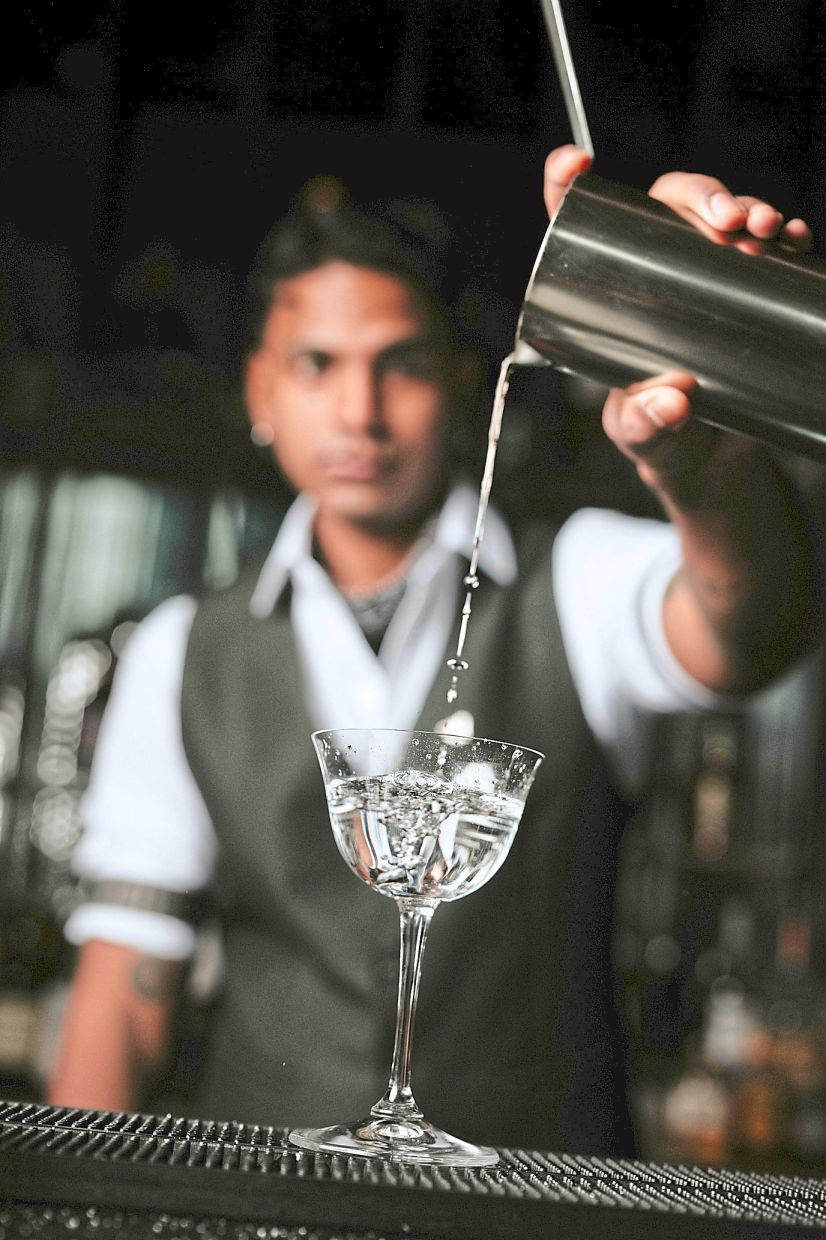 A Living Room mixologist in action.
