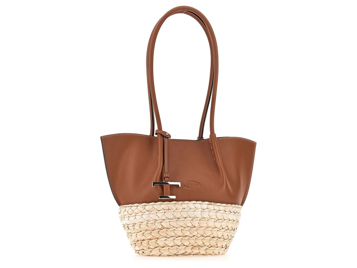 Crafted in calfskin nappa leather with a handwoven corn leaf base, this Shopping Bag is perfect for daily use and when on vacation.Photo: Tod’s