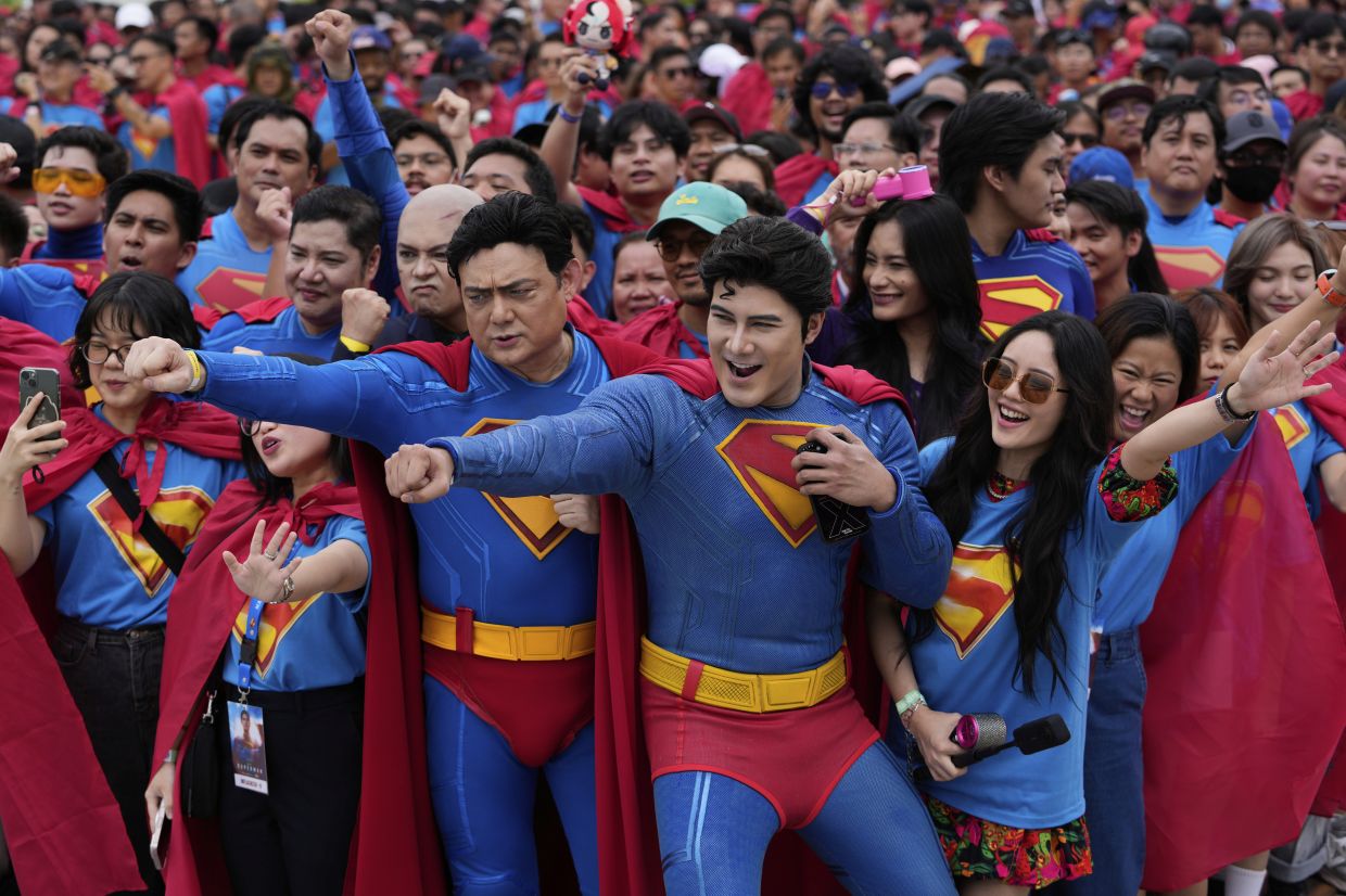 Superman fans dressed in costumes posing during an event as part of the first stop of the Superman World Tour in Pasig city, Philippines on Thursday June 19, 2025. - AP 