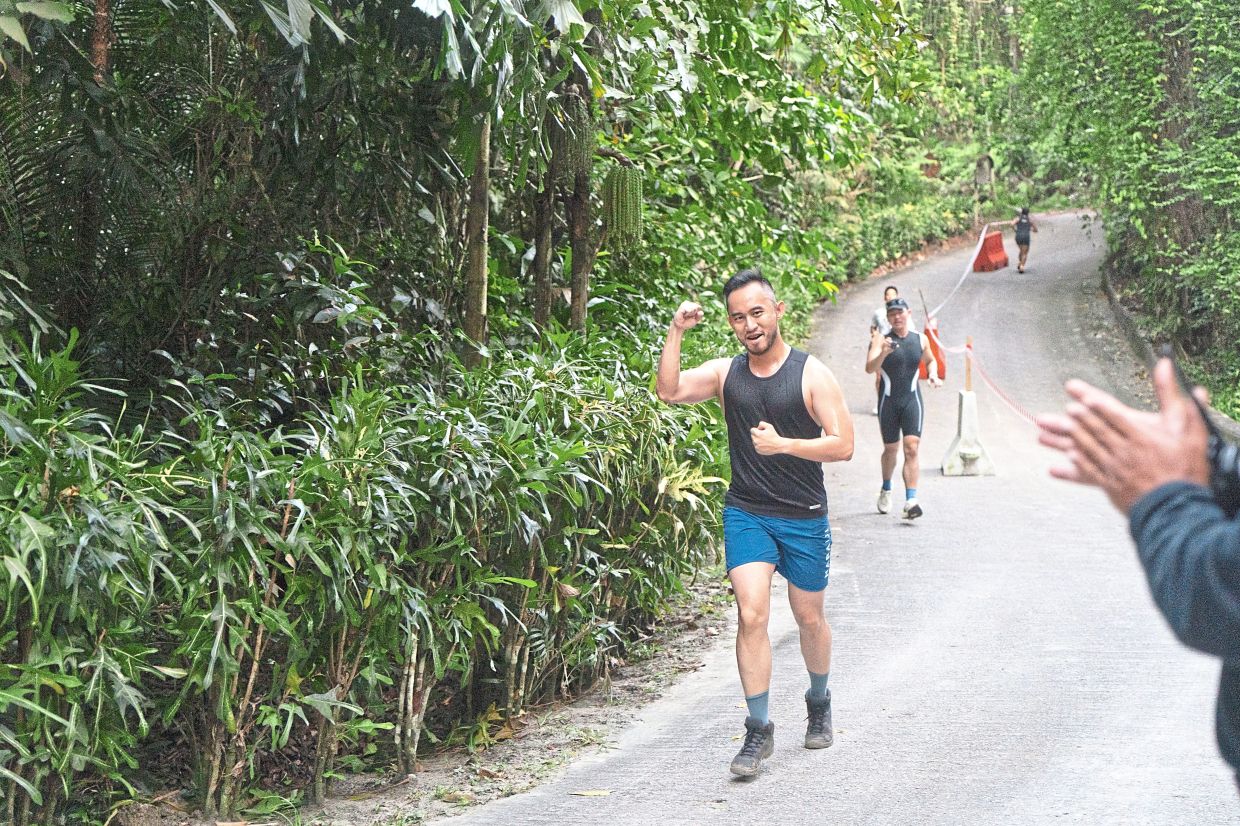 Lim on the course which encompasses road and trail runs and an open sea swim. — Photos: Courtesy pics
