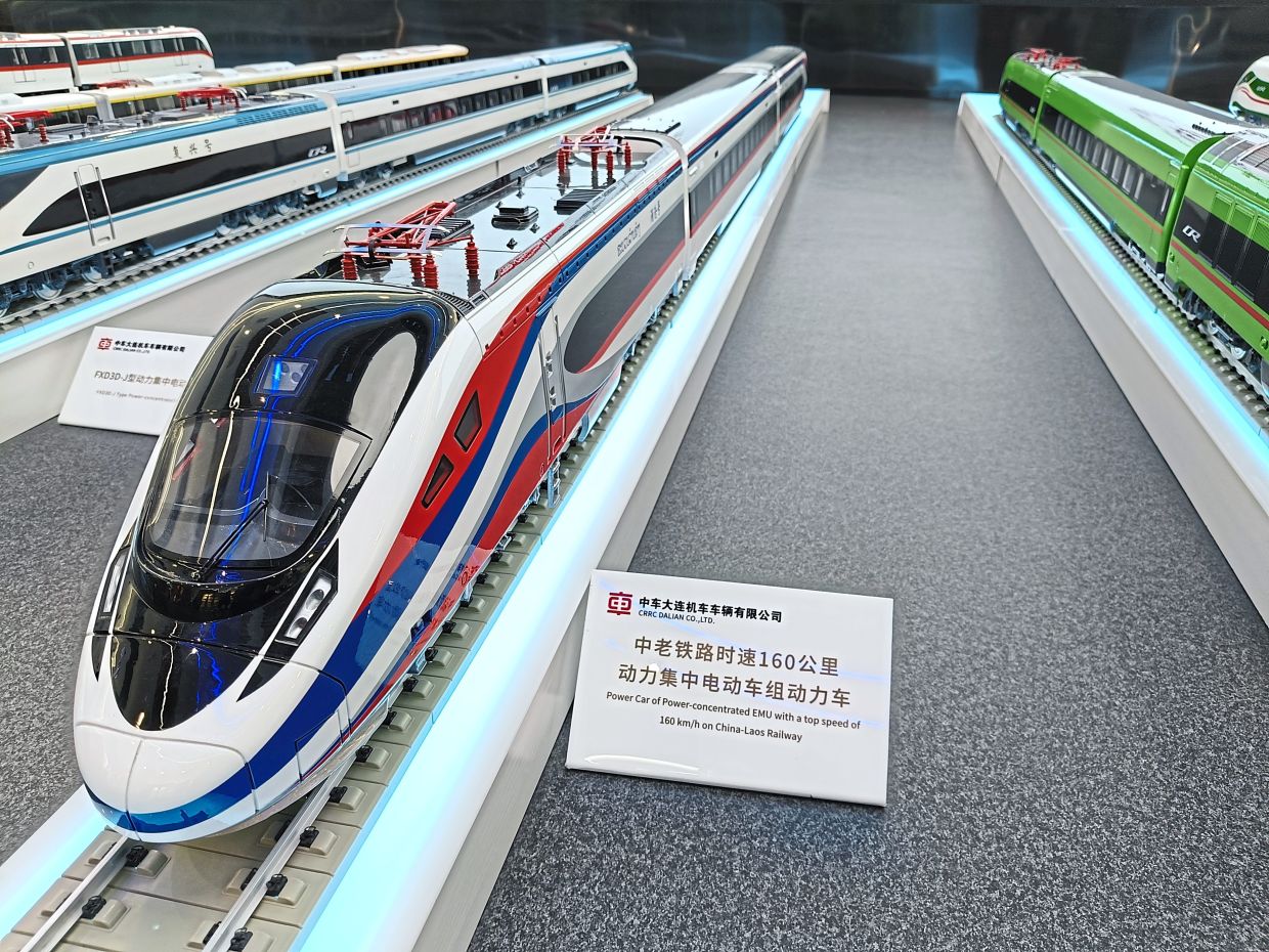 A model of the sleek medium speed train that was introduced on the Laos-China railway In 2021, running at speeds of up to 160kph. A variant of this model will be used for the ECRL to enable travel from Kota Baru to Gombak in just four hours. —Photos: MENG YEW CHOONG/The Star