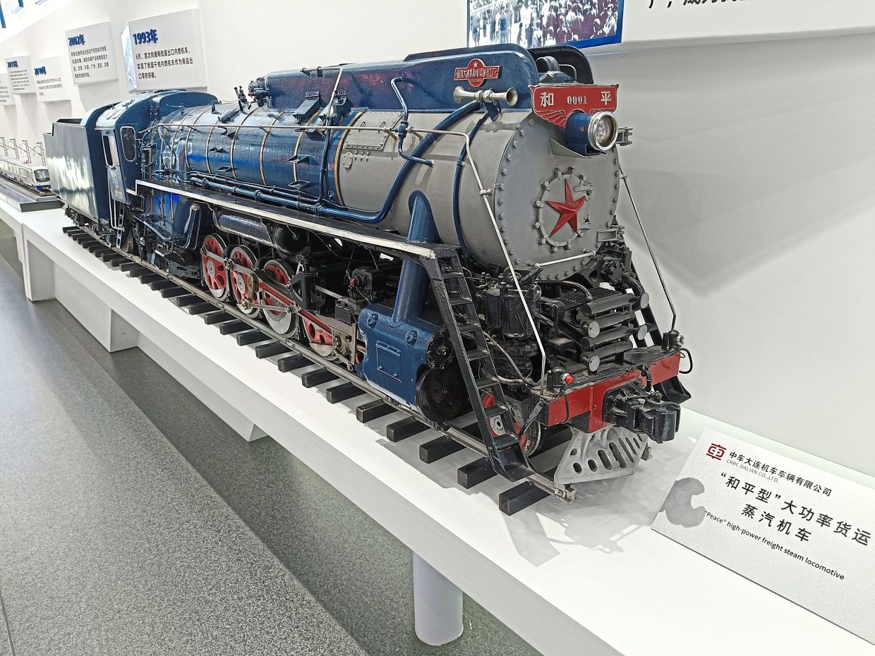In 1956, the first 'He Ping' (Peace) steam locomotive for freight was produced, marking the start of China's steam locomotive design journey. This is a replica on display at CRRC Dalian's visitor centre.