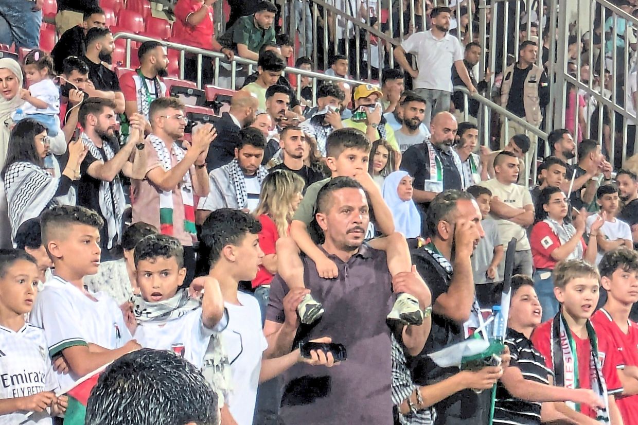 Palestinian fans living in Jordan came out in full force to watch the match. — AP