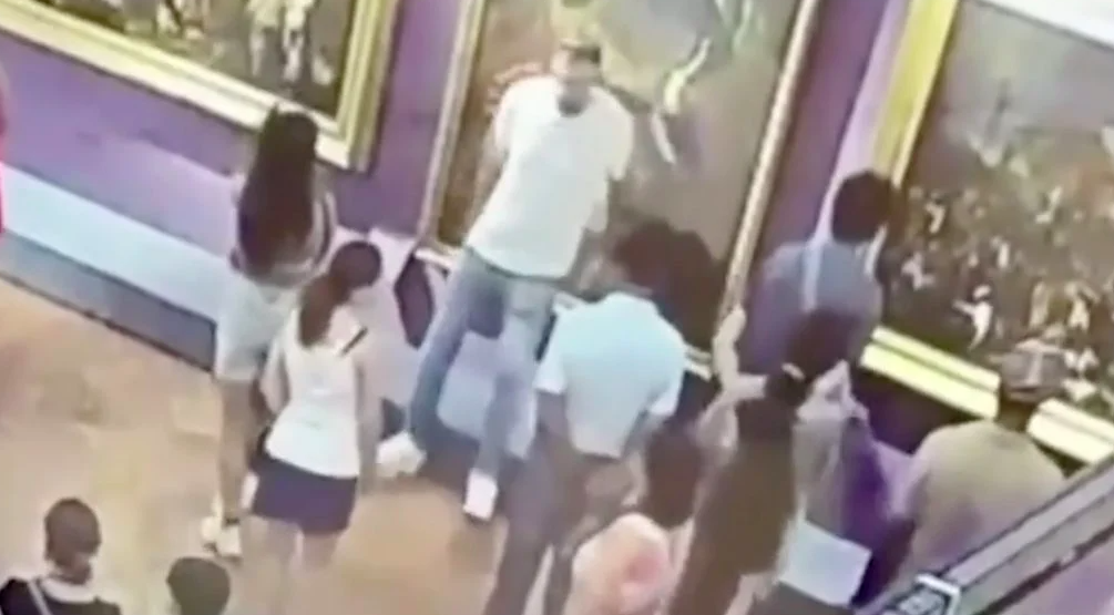 An unidentified tourist leaned on Anton Domenico Gabbiani’s 'Portrait Of Ferdinando de’ Medici' for a photo - until the canvas gave way. Photo: YouTube/Screenshot 