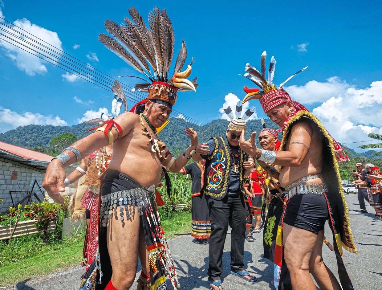 Bidayuh warriors performing a traditional dance.