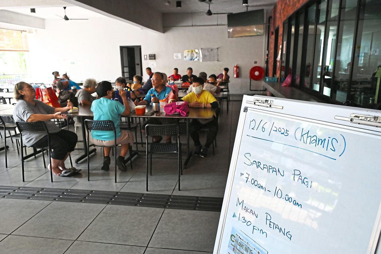 Residents waiting for their meals.