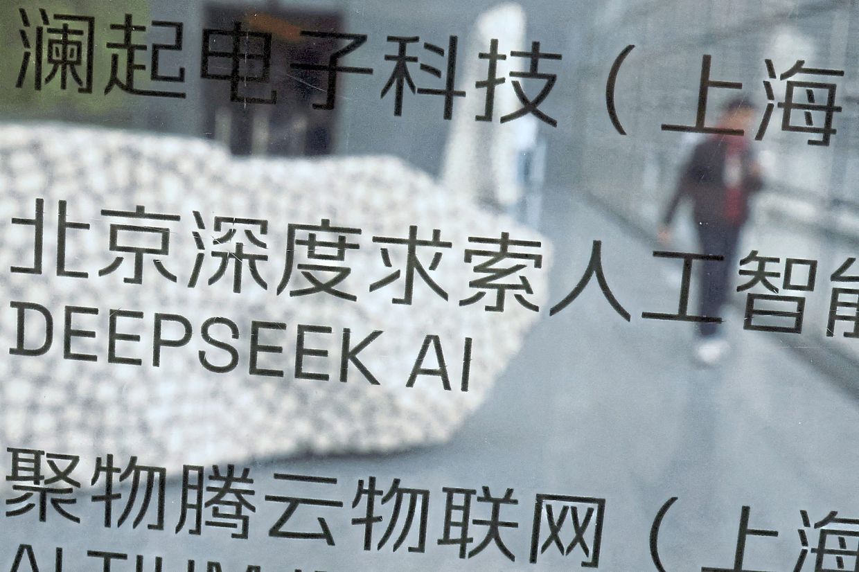 
New wave: Signage outside DeepSeek’s office in Beijing. The company’s AI is considered much cheaper to set up than Western competitors. — Reuters 