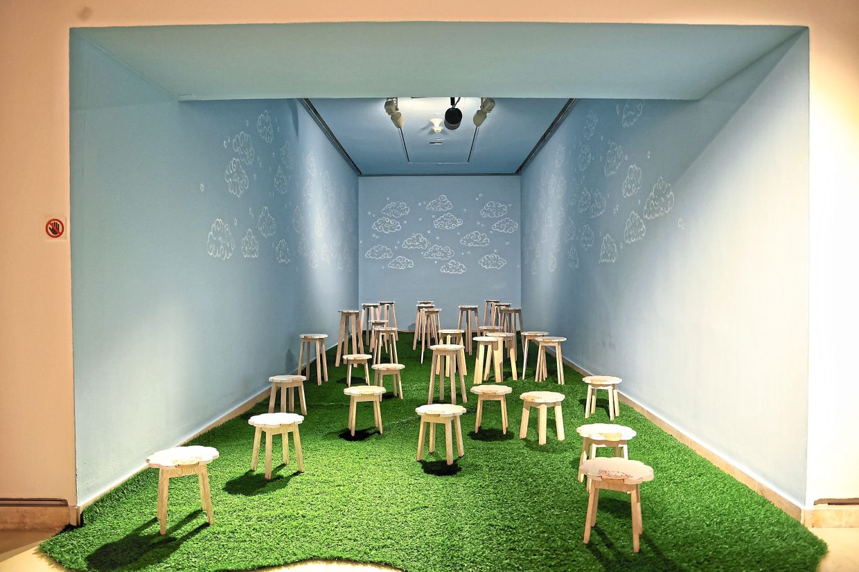 In Aimman Hafizal’s 'The 32nd Silence', viewers are invited not to sit, but to engage through observation - searching for the one stool that quietly breaks formation. Photo: The Star/Muhamad Shahril Rosli