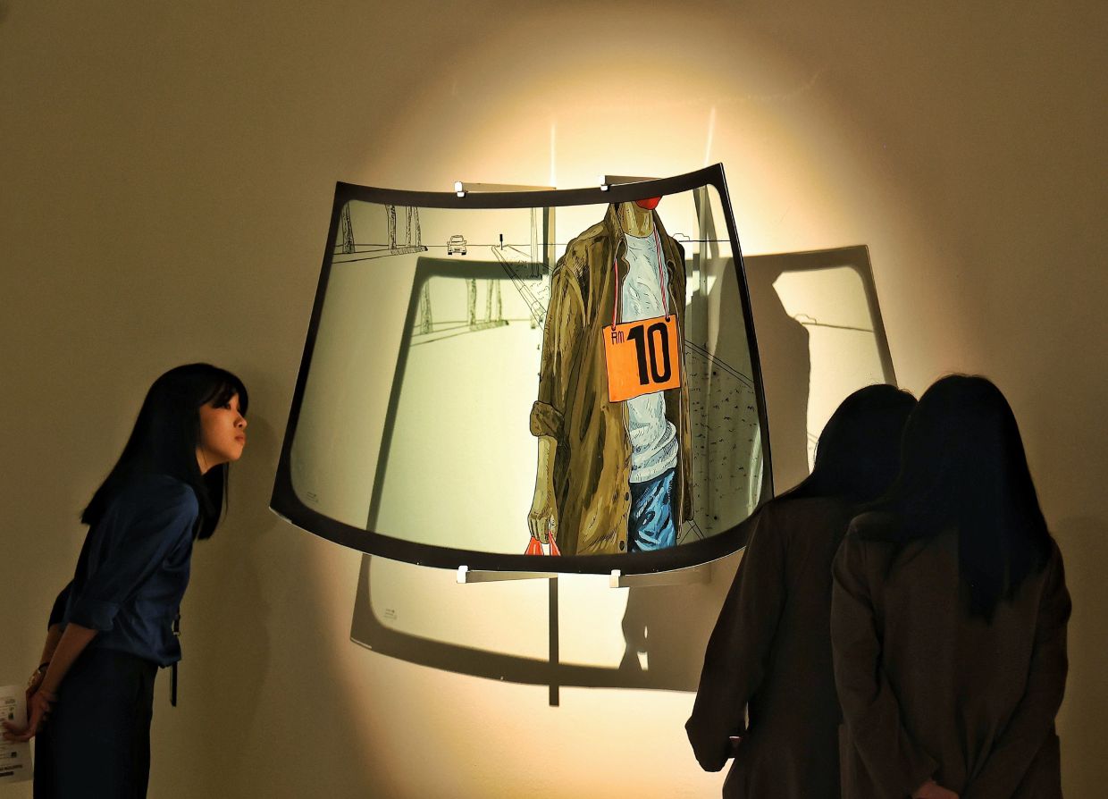 'This piece was inspired by moments of silent observation – watching life unfold from inside my vehicle, separated by glass,' says Azim Rodi about his series at Galeri Petronas. Photo: The Star/Muhamad Shahril Rosli