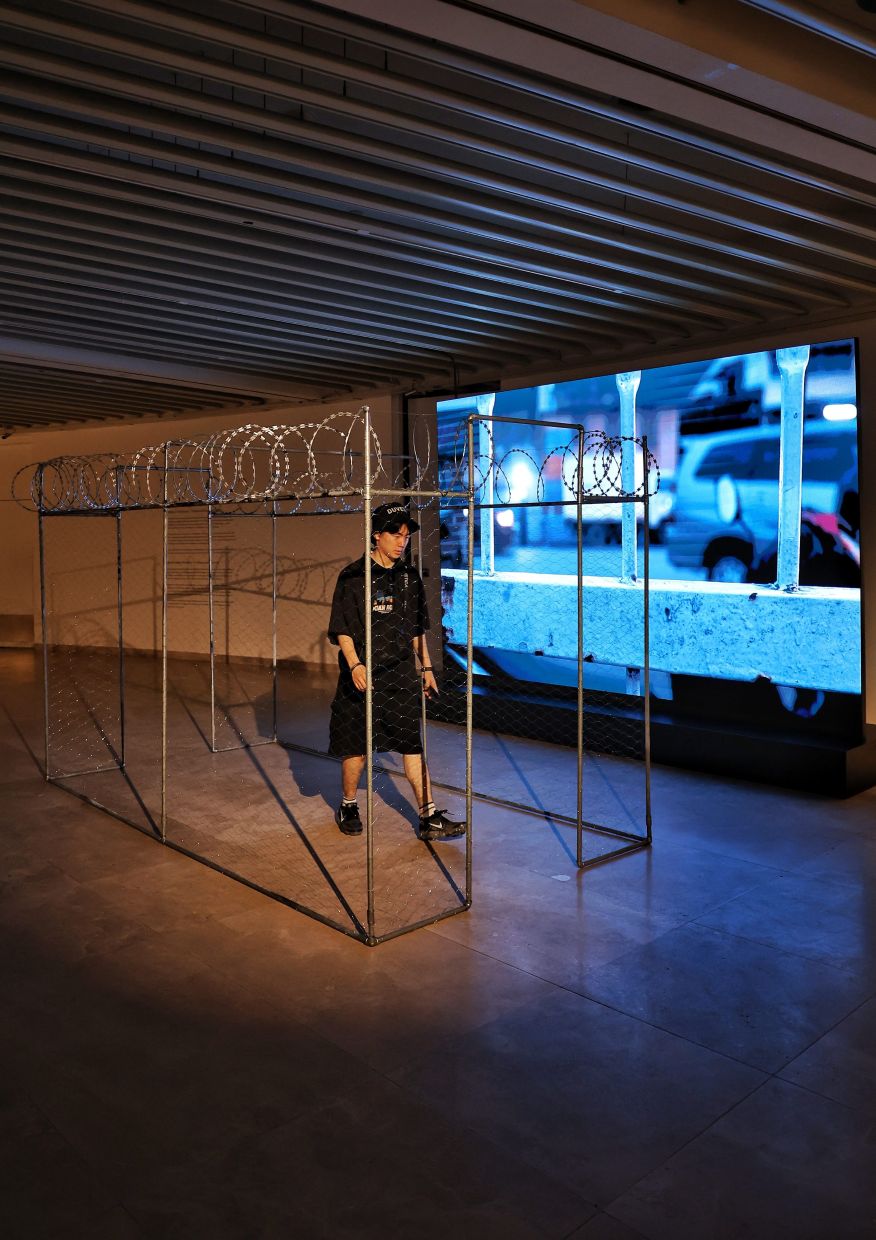 A view of Zulkefli Jais’ installation 'Anything But Prison', which reflects on the trauma of forced displacement and is accompanied by a five-minute video. Photo: The Star/Muhamad Shahril Rosli