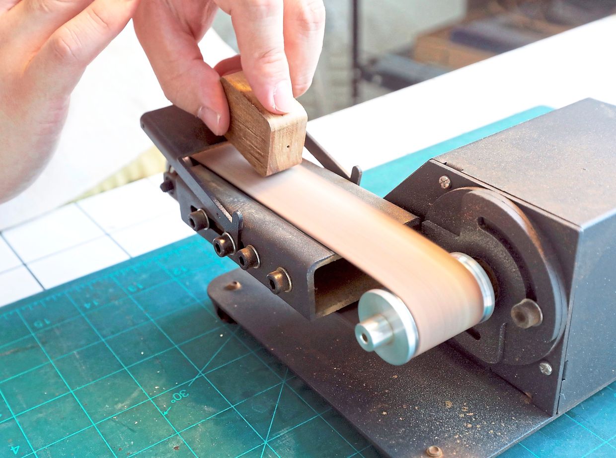 Each tile is carefully sanded to ensure a smooth finish, free from any wood splinters or rough edges.