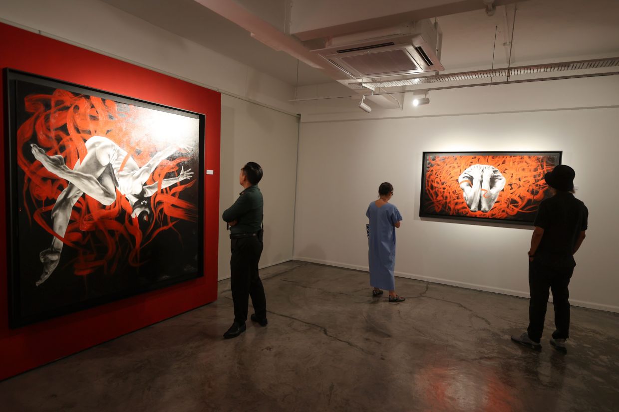In his new show at Harta Space, Bayu unveils 16 large-scale, emotionally charged paintings of contorted, anonymous male figures, blurring the lines between abstract and figurative. Photo: The Star/Glenn Guan 