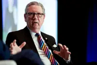 Fed's Schmid supports wait-and-see approach