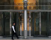 Hong Kong's de facto central bank intervenes as Hong Kong dollar hits weak end of trading range