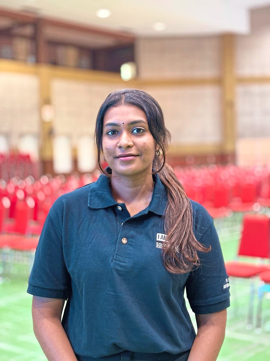 Sharmini is happy to get aid to pay for her graphic design education.