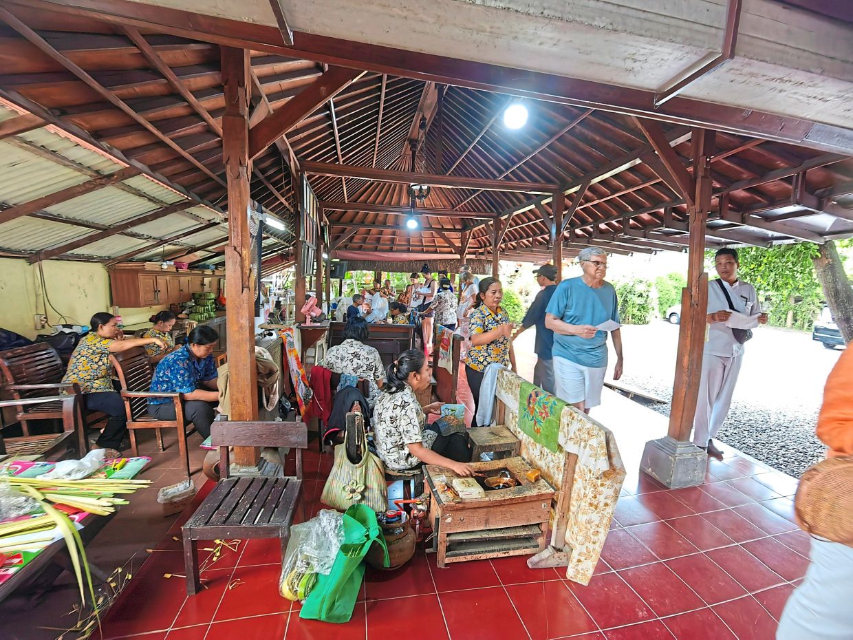 At the Art Village, visitors can see the process of creating traditional Indonesian batik.