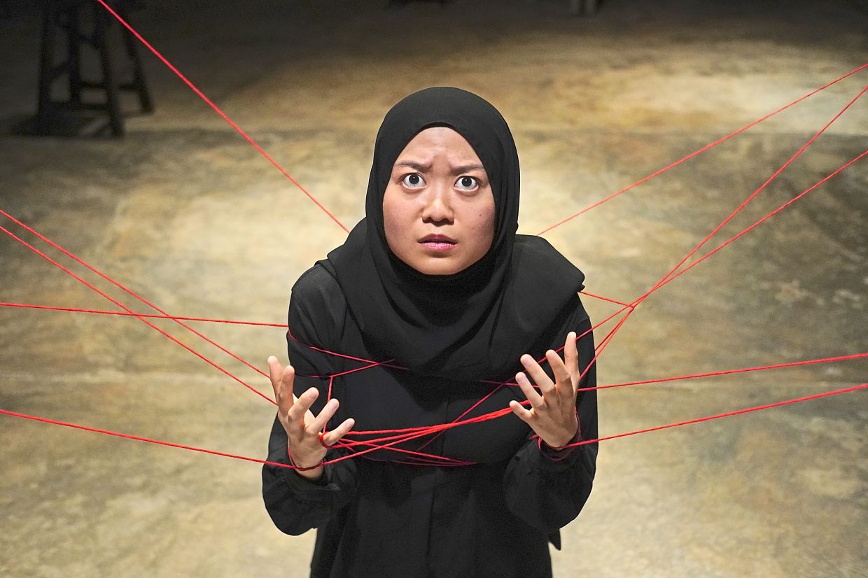 Sofea Lee in a scene from 'Burden Of Proof', staged in Penang in 2023. Photo: Dabble Dabble Jer Collective