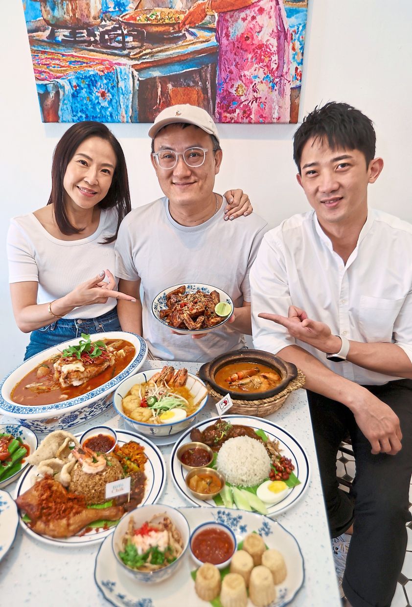 (From left) Yun, Wong and Chiam presenting an array of Peranakan favourites. — Photos: LOW BOON TAT/The Star