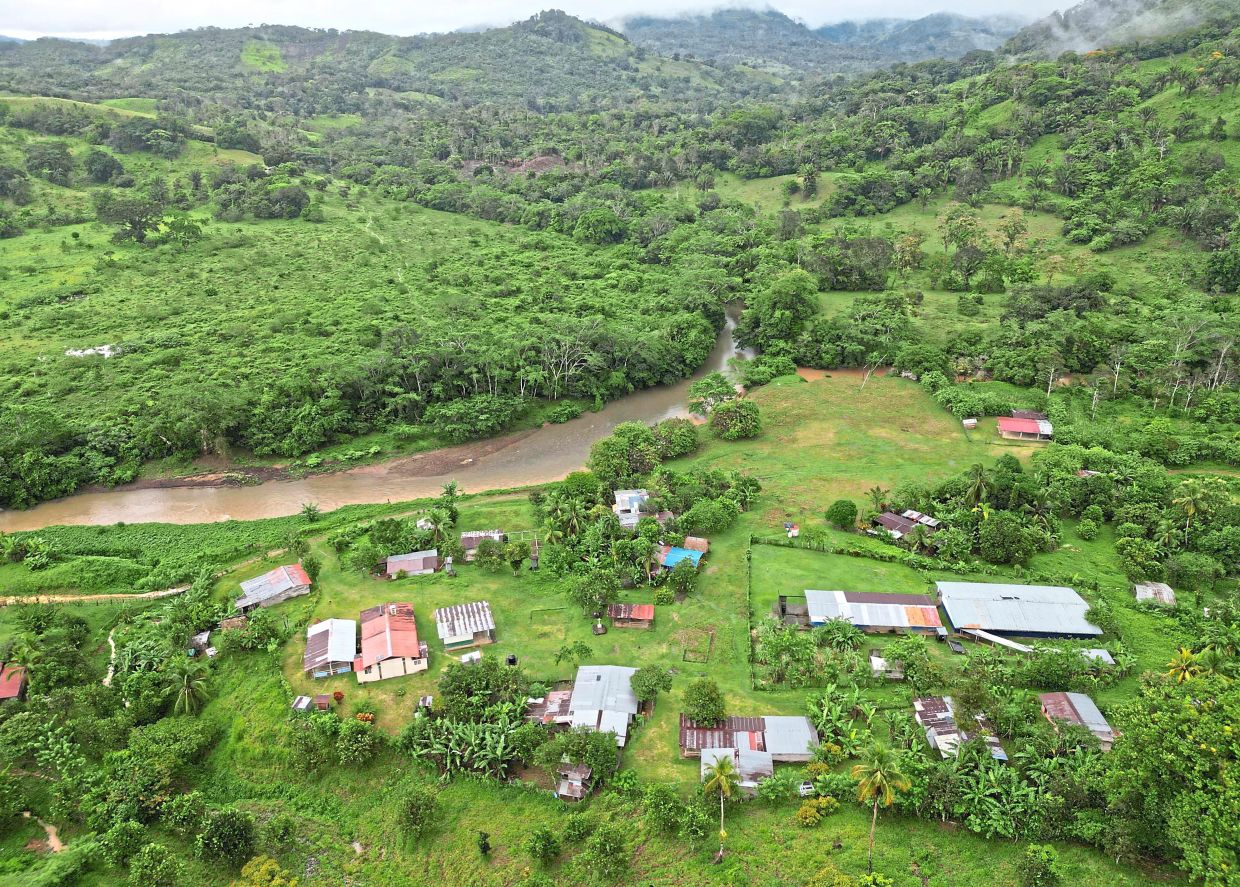 An aerial view of the village of La Boca de Uracillo. The village will be destroyed when the dam is built. — AFP