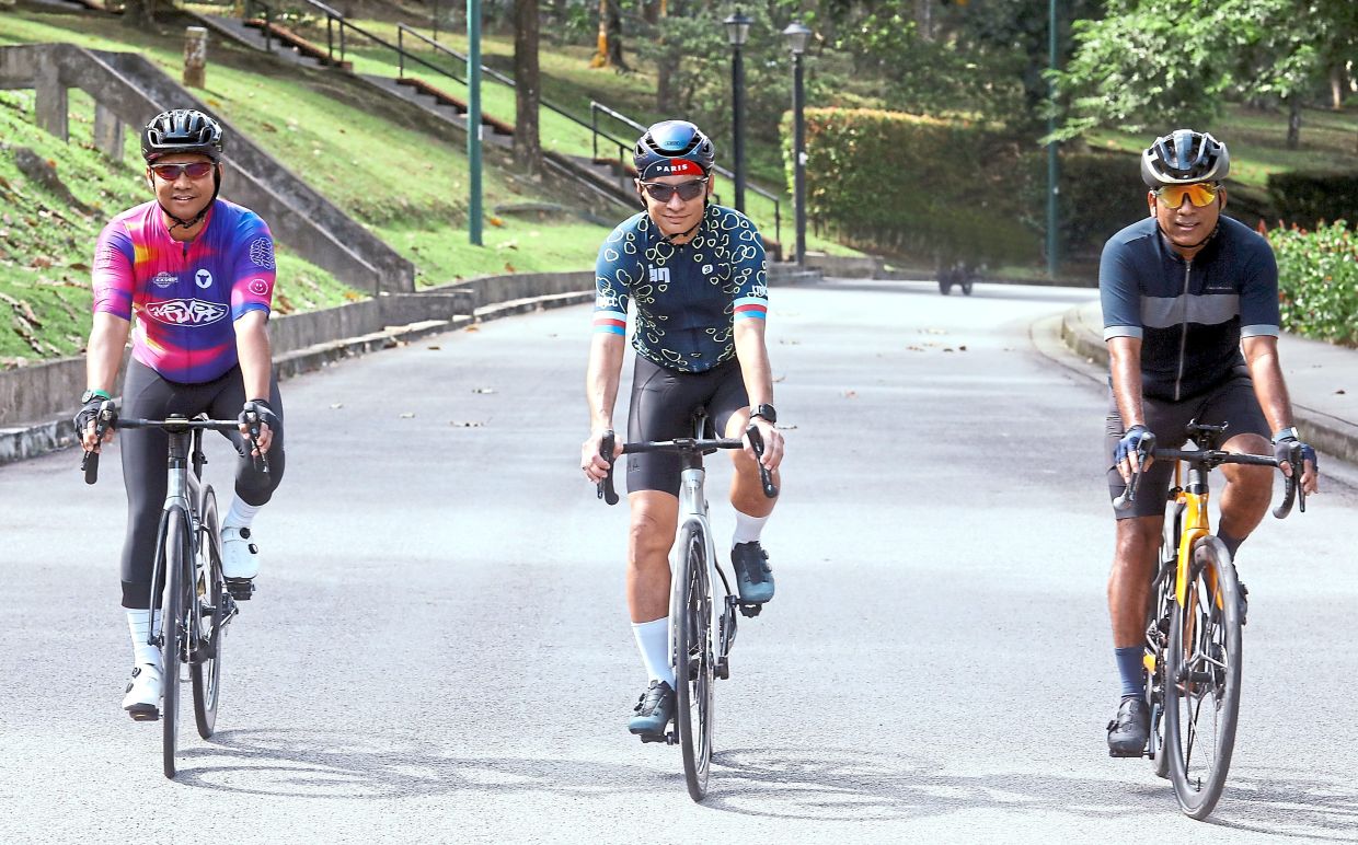 (From left) Adissadikin, Dr Jeffrey Jeswant and Chandran each has his own personal goal in cycling.