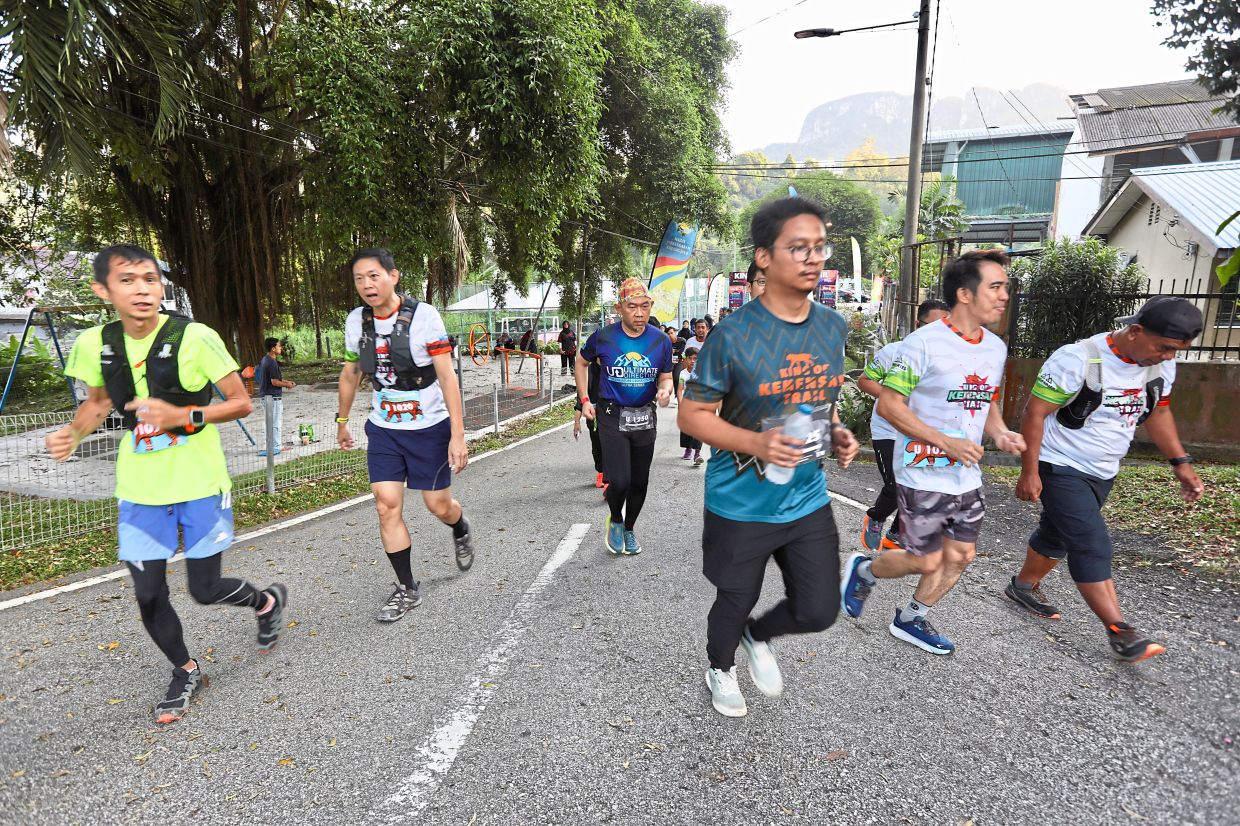The event saw 1,600 trail runners taking on the hills and jungles in Kemensah, Hulu Kelang. — Photos: Low Lay Phon/The Star