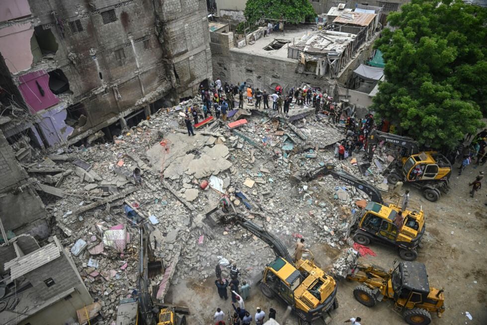 Up to 100 people had been living in the building, senior police officer Arif Aziz told AFP. - Photo: AFP